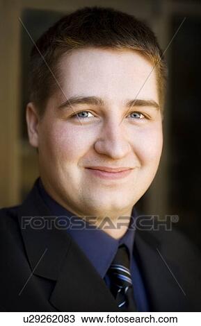Stock Image - Portrait of a man in a suit. Fotosearch