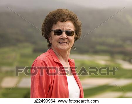 Picture - Portrait of a woman with sunglasses. Fotosearch