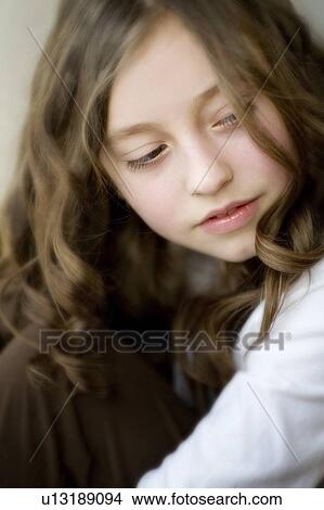 Portrait of a young girl View Large Photo Image Picture - Portrait of a young girl. Fotosearch