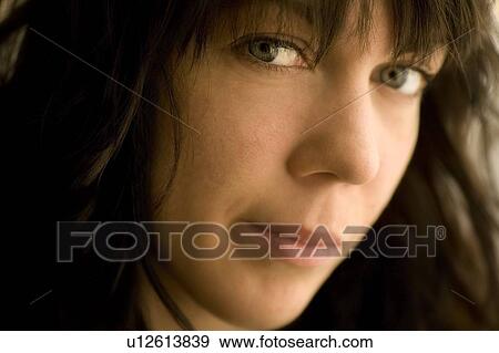 Portrait of a young woman View Large Photo Image Stock Photo - Portrait of a young woman. Fotosearch