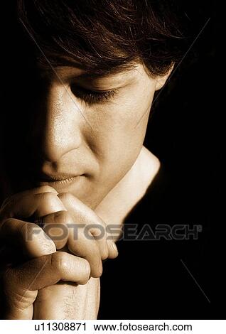 Praying man View Large Photo Image Stock Image - Praying man. Fotosearch