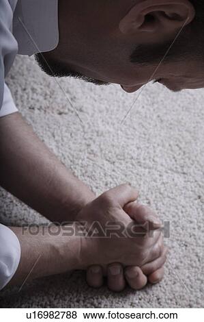 Praying man View Large Photo Image Stock Photo - Praying man. Fotosearch