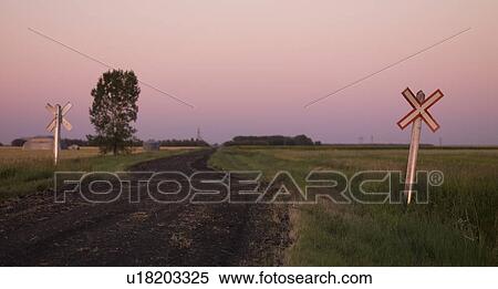 Railroad crossing, Manitoba, Canada View Large Photo Image Stock Photography - Railroad crossing, Manitoba, Canada. Fotosearch