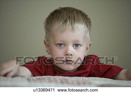 Sad looking boy View Large Photo Image Stock Image - Sad looking boy. Fotosearch