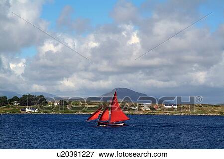 Sailboat on lake, Roundstone, Galway, Ireland View Large Photo Image Stock Photo - Sailboat on lake, Roundstone, Galway, Ireland. Fotosearch