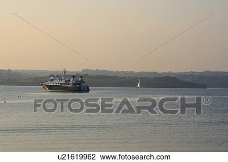 Stock Image - Sailing in Kinsale Harbour with James Fort in Background, Kinsale, Cork, Ireland. Fotosearch