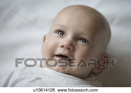 Smiling baby View Large Photo Image Stock Photograph - Smiling baby. Fotosearch