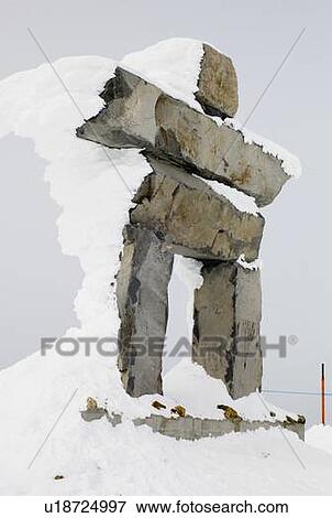 Snow-covered inuksuk View Large Photo Image Stock Photo - Snow-covered inuksuk. Fotosearch