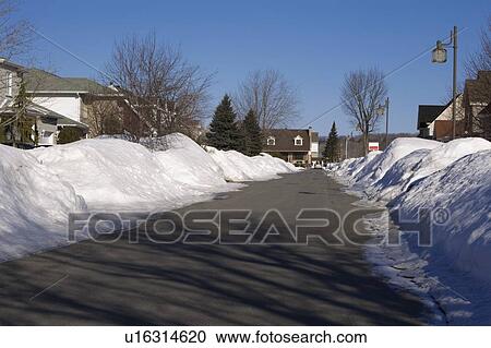 Snow piled on edge of street View Large Photo Image Stock Image - Snow piled on edge of street. Fotosearch