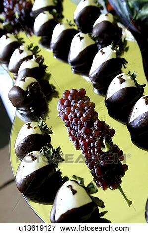 Strawberries decorated to look like tuxedos View Large Photo Image Stock Photo - Strawberries decorated to look like tuxedos. Fotosearch