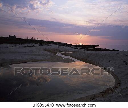 Stock Image - Stream with cloud reflection. Fotosearch