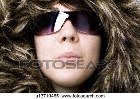 Stock Photography - Sunglasses and fur hood. Fotosearch