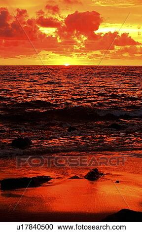Stock Image - Sunset on the ocean in Mazatlán, Mexico. Fotosearch