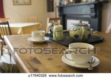 Stock Photograph - Tea set on table. Fotosearch