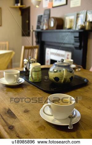 Stock Photograph - Tea set on table. Fotosearch