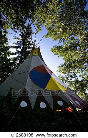 Tepee under trees View Large Photo Image Stock Photo - Tepee under trees. Fotosearch