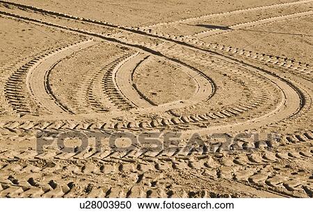 Tire tracks in the sand View Large Photo Image Stock Image - Tire tracks in the sand. Fotosearch