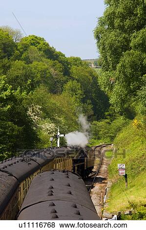 Train Going Through Goathland, North Yorkshire, England View Large Photo Image Stock Photo - Train Going Through Goathland, North Yorkshire, England. Fotosearch