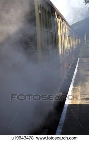 Train In Station In Goathland, North Yorkshire, England View Large Photo Image Stock Photo - Train In Station In Goathland, North Yorkshire, England. Fotosearch