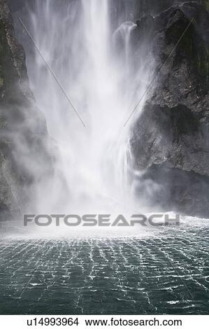 Picture - Waterfall, Milford Sound, New Zealand. Fotosearch