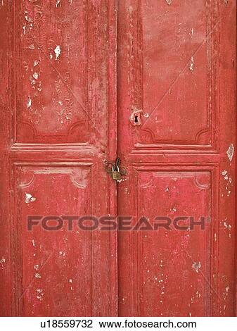 Stock Image - Weathered wooden door. Fotosearch