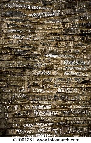 Wet stone wall View Large Photo Image Stock Image - Wet stone wall. Fotosearch
