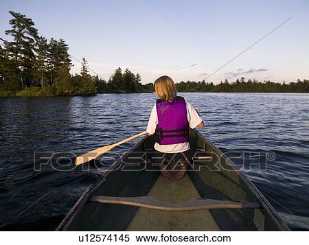Woman canoeing View Large Photo Image Stock Photography - Woman canoeing. Fotosearch