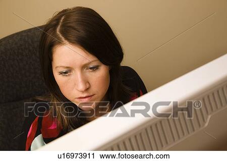 Woman on the computer View Large Photo Image Stock Image - Woman on the computer. Fotosearch