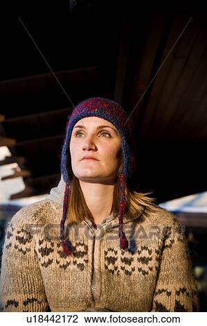 Woman wearing toque and sweater View Large Photo Image Stock Image - Woman wearing toque and sweater. Fotosearch