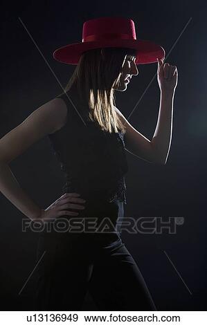 Woman with red hat View Large Photo Image Stock Photo - Woman with red hat. Fotosearch