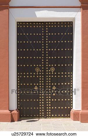 Wooden church doors with brass View Large Photo Image Picture - Wooden church doors with brass. Fotosearch