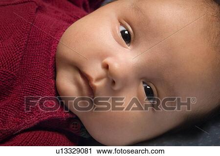 Stock Image - Baby face. Fotosearch