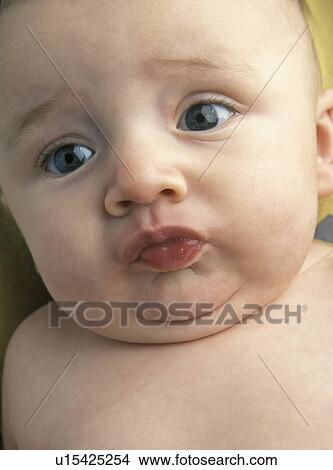 Baby making faces View Large Photo Image Picture - Baby making faces. Fotosearch
