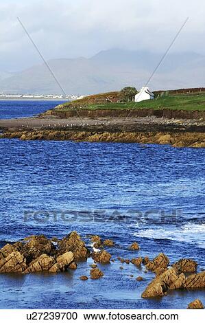 Stock Image - Ballinskelligs, Waterville, County Kerry, Ireland; View of coastline. Fotosearch