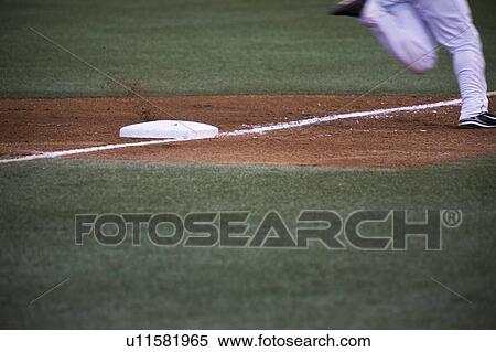 Baseball player running home View Large Photo Image Stock Photography - Baseball player running home. Fotosearch
