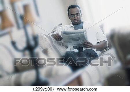 Bright light reading paper View Large Photo Image Stock Photo - Bright light reading paper. Fotosearch