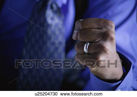 Businessman's fist View Large Photo Image Stock Image - Businessman's fist. Fotosearch