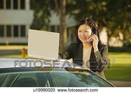 Businesswoman on cell phone View Large Photo Image Stock Image - Businesswoman on cell phone. Fotosearch