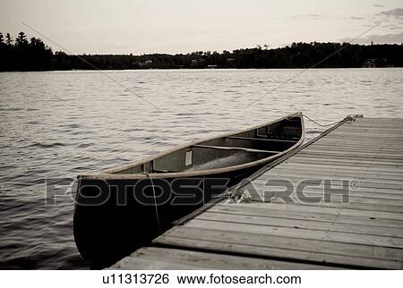 Canoe at dock, Lake of the Woods, Ontario, Canada View Large Photo Image Stock Photograph - Canoe at dock, Lake of the Woods, Ontario, Canada. Fotosearch