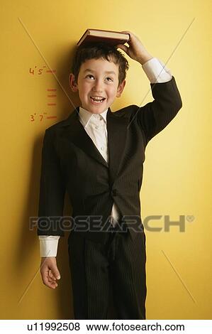 Child measuring height View Large Photo Image Stock Photo - Child measuring height. Fotosearch