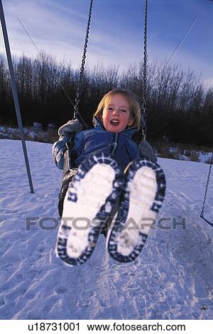 Child on swing View Large Photo Image Stock Image - Child on swing. Fotosearch