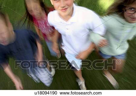 Children running together View Large Photo Image Stock Image - Children running together. Fotosearch