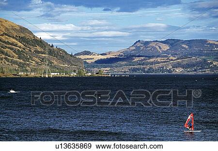 Clarkston, Idaho, USA; Man windsurfing down a river View Large Photo Image Stock Photo - Clarkston, Idaho, USA; Man windsurfing down a river. Fotosearch