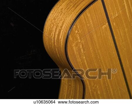 Picture - Close-up of an acoustic guitar. Fotosearch
