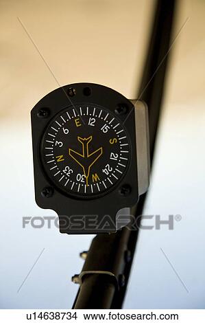 Compass attached to a helicopter beam View Large Photo Image Picture - Compass attached to a helicopter beam. Fotosearch