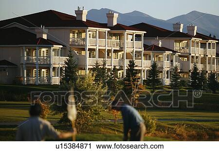 Condos on a golf course View Large Photo Image Stock Image - Condos on a golf course. Fotosearch