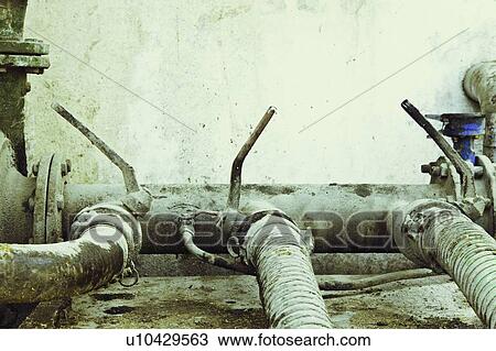 Stock Image - Controls on pumping system . Fotosearch