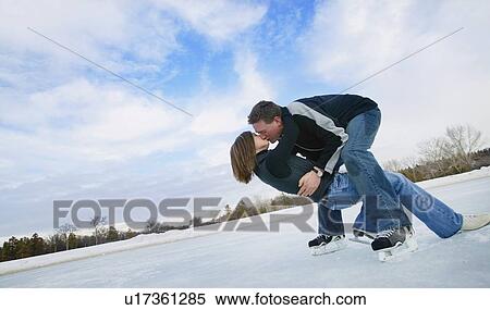 Stock Photography - Couple skating. Fotosearch
