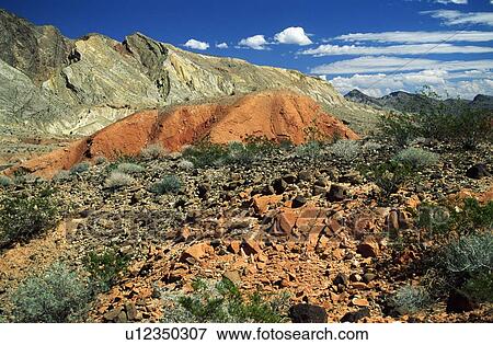 Death Valley, California, USA; Red rock formations and mountains View Large Photo Image Stock Photo - Death Valley, California, USA; Red rock formations and mountains. Fotosearch