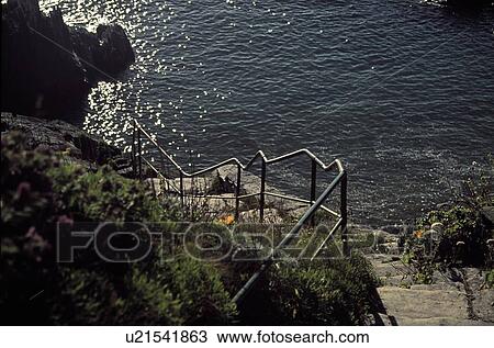 Devon, England, United Kingdom; Rough stone steps leading down to the sea View Large Photo Image Stock Image - Devon, England, United Kingdom; Rough stone steps leading down to the sea. Fotosearch